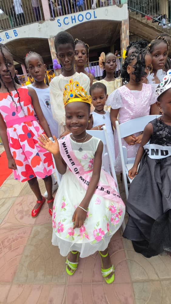 A pupil crowned during a BBBIS awards presentation