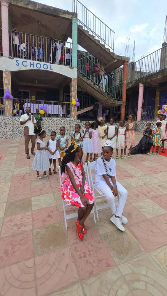 Pupils dressed for a BBBIS cultural celebration in the courtyard