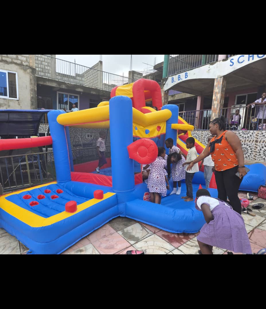 Children enjoying the bouncy castle at a BBBIS fun day