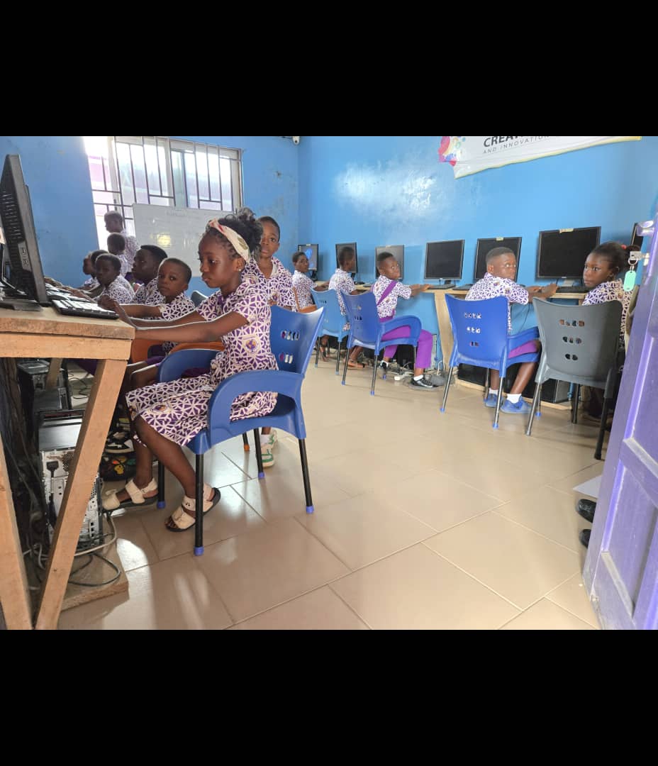 Pupils at networked workstations during an ICT lesson